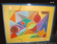 Full view of original framed oil pastel abstract artwork with blue frame and yellow matting showing the water damage on the mat but not the art.