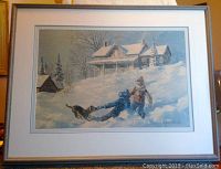Framed print showing winter scene with two children and a dog in snow outside a country house.