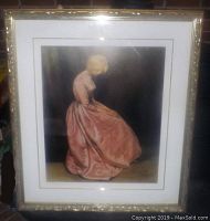 Overall view of the framed watercolor print showing the gilt frame and matting.