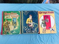 Lot of three antique children's books with color illustrated covers: Robinson Crusoe, The Wonder Book of Do You Know?, Chatterbox Newsbox.
