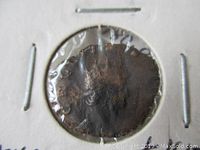 Front side of an ancient Roman coin showing bust of Emperor Gallienus with significant wear.
