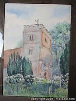 Full view of the watercolor painting showing Springfield Church with surrounding landscape including trees and graveyard under glass in wood frame.