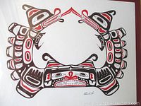 Full view of original Haida style ink artwork in black and red with animal motifs on white background, showing framing and matting