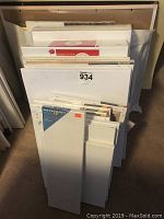 Stack of blank art canvases in various sizes, front view