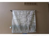 Full view of the fine art tapestry showing birch tree design hanging on wall