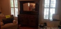 Front view of sideboard base with mirror attached