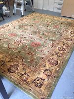 Full view of the Jaipur Collection wool area rug on garage floor