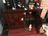 Closed view of the Random Harvest Studio Oxford double block chest hutch with top items and closed cabinet doors showing geometric block wood design.