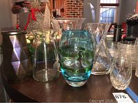 Overview of all vases and crystal bowl on table