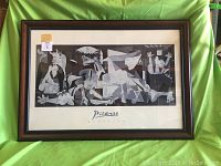 Full framed print on green background, showing entire artwork and frame