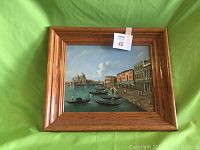 Front view of the framed Venice oil painting showing the entire artwork and frame.