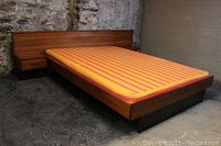 Assembled bed frame with foam mattress installed