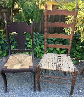 Photo showing both wooden chairs placed outdoors on gravel with greenery in background, one chair taller with lighter wood and spindle back, the other shorter with darker wood and carved back. Both have damaged woven seats.