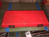 Red textured plastic case with black latches, embossed with Snap-On RTD33 fractional/metric rethreading set text.