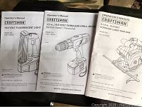 Operator's manuals for Craftsman 19.2 Volt fluorescent light, cordless drill, and laser trim saw, showing model numbers and basic diagrams.