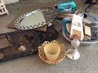 Photo of assorted serving platters, serving tray, lamp, foil bakeware, and small candlestick showing condition and variety of lot items.