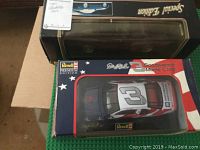 Dale Earnhardt No. 3 Goodwrench Monte Carlo race car model by Revell in original box with patriotic stars and stripes design visible through window