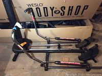 Bodytone 300 rowing machine fully assembled showing the frame, padded seat, and handles.
