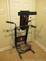 Front and side views of metal weight bench and weights showing mildew and condition