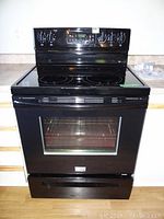 Full front view of black Frigidaire electric range