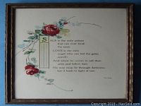 Framed poem with painted roses and text clearly visible, showing overall presentation and framing.