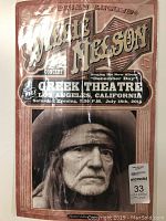 Full view of Willie Nelson concert poster with event and album details.