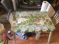 Child-sized rectangular table and two chairs set