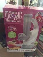 Box of Magic Bullet Dessert Bullet showing front of package with images and text indicating it is a dessert maker appliance.