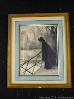 Full view of the small framed ink and wash drawing showing the lady figure and outdoor scene within a wooden frame with blue and cream matting.