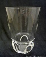 Full view of the clear Steuben crystal bouquet vase showing overall shape, height, and flared opening.
