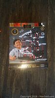 Full view of F.A.O. Schwarz 321-piece marble run box showing packaging and product image with smiling child playing with the assembled marble run.