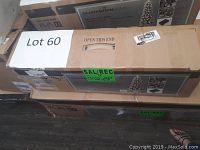Boxes of Gluckstein Home 4.5 ft Yukon Porch Tree with packaging showing product image and details.