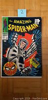 Front cover of The Amazing Spider-Man #58 depicting Spider-Man in robotic armor with price 12 cents and Marvel Comics logo.