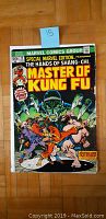 Front cover of comic book showing title, cover art of Shang-Chi, and overall condition.