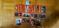 Photo shows approximately 40 trading cards spread on a parquet floor with a note indicating 69 cards. Cards feature various Star Wars characters from Return of the Jedi.