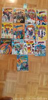 Photo of 13 DC Blue Ribbon Digest comic books laid out on floor showing front covers.