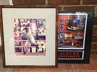 Framed photograph of Bo Jackson batting and Auburn University canvas print side by side against a brick background.