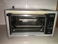 Hamilton Beach convection toaster oven front closed with digital controls