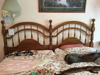 Oak king size poster style headboard with twin arches and spindle detailing