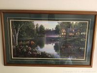 Framed print titled Sweet Serenity depicting a lake scene with cabin and deer.