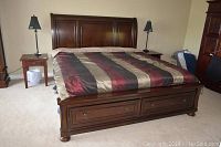 Front view showing full bed frame and two footboard drawers