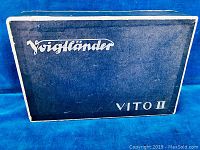 Blue Voigtländer box with VITO II branding on top.