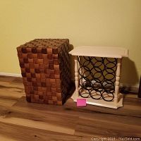 Photo showing both the woven wood stool and the wine rack with cream wood frame and black metal circular holders.