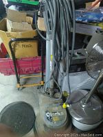 Clarke FM1500 floor buffer showing housing, handle and power cord