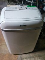 Front view of the white Danby portable air conditioning unit with logo visible.
