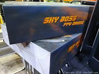 Two stacked boxes of Riviera Sky Boss FPV drone showing branding on side of boxes