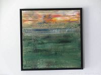 Front view of framed abstract landscape painting