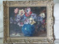 Full front view of framed oil painting showing floral still life in a blue vase