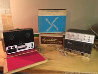 All three components on tabletop with original boxes