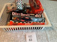 Basket with various mini cars, including boxed Dirt Devil #40 NASCAR car and a Convoy Rookie Star Kenney Wallace model.